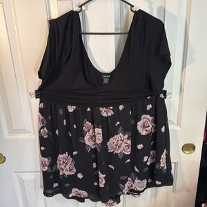 Torrid low cut top, flowy flower bottom half.